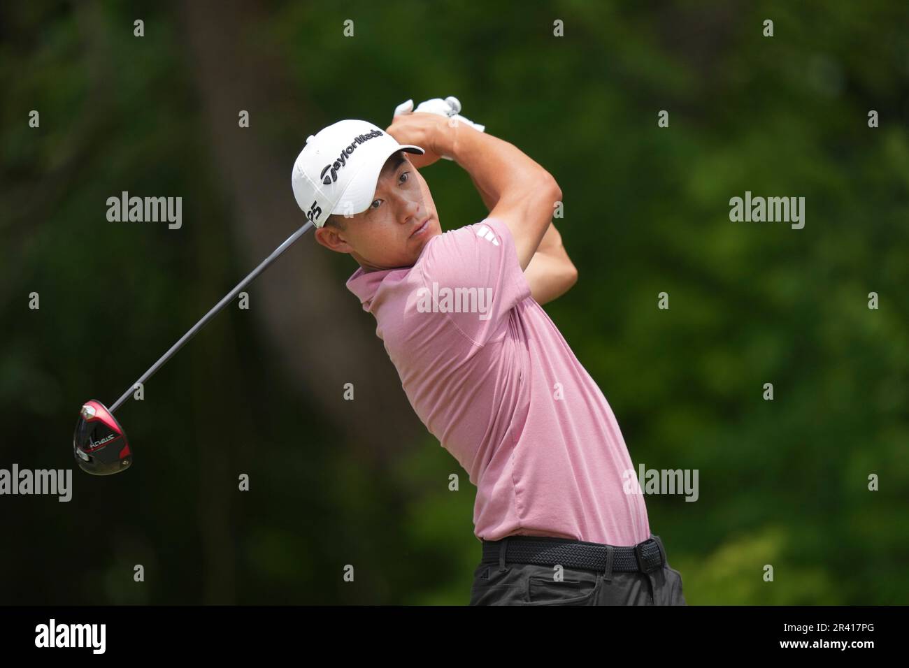 Collin Morikawa hits a tee shot on the sixth hole during the first round of the Charles Schwab Challenge golf tournament at the Colonial Country Club in Fort Worth, Texas, Thursday, May 25, 2023. (AP Photo/LM Otero) Stock Photo