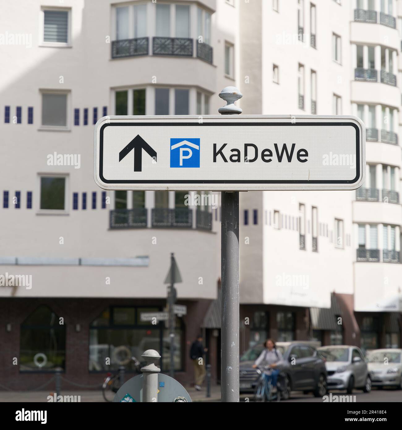 Street sign indicating a parking garage for customers of KaDeWe, Kaufhaus des Westens Stock Photo