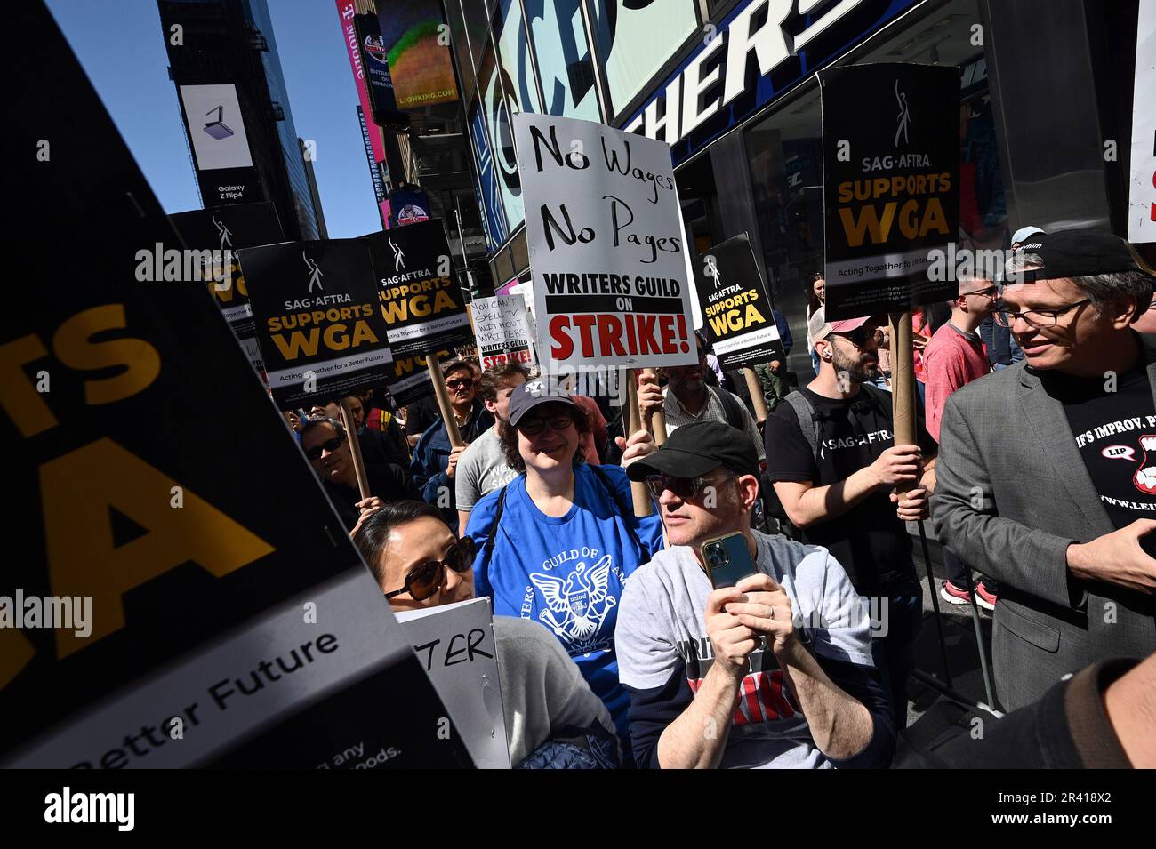 New York, USA. 25th May, 2023. Members of the Writers Guild of America (WGA) and their supporters hold an organized protest outside of Paramount offices in Times Square, New York, NY, May 25, 2023. The Writers Guild of America-East (WGA) is on strike against the Alliance of Motion Picture and Television Producers for better contract and residual rights. (Photo by Anthony Behar/Sipa USA) Credit: Sipa USA/Alamy Live News Stock Photo