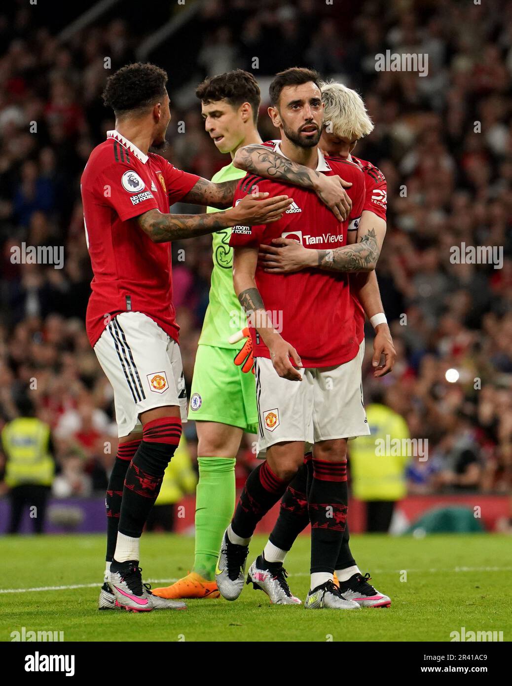 Manchester United's Bruno Fernandes (centre) celebrates scoring their side's third goal of the game from the penalty spot during the Premier League match at Old Trafford, Manchester. Picture date: Thursday May 25, 2023. Stock Photo