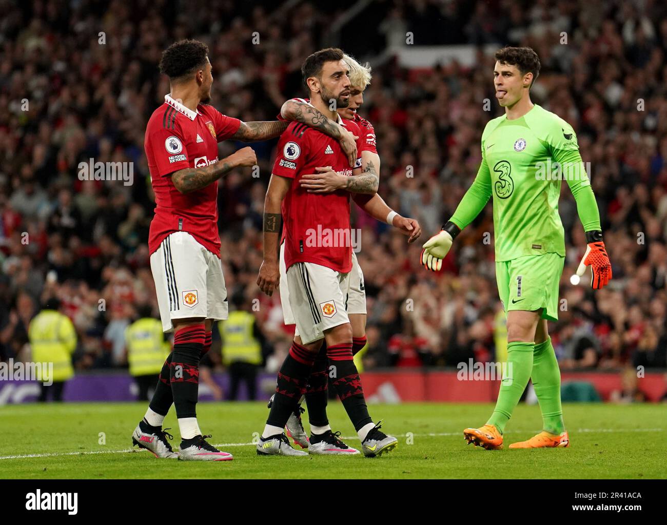 Manchester United's Bruno Fernandes (centre) celebrates scoring their side's third goal of the game from the penalty spot during the Premier League match at Old Trafford, Manchester. Picture date: Thursday May 25, 2023. Stock Photo