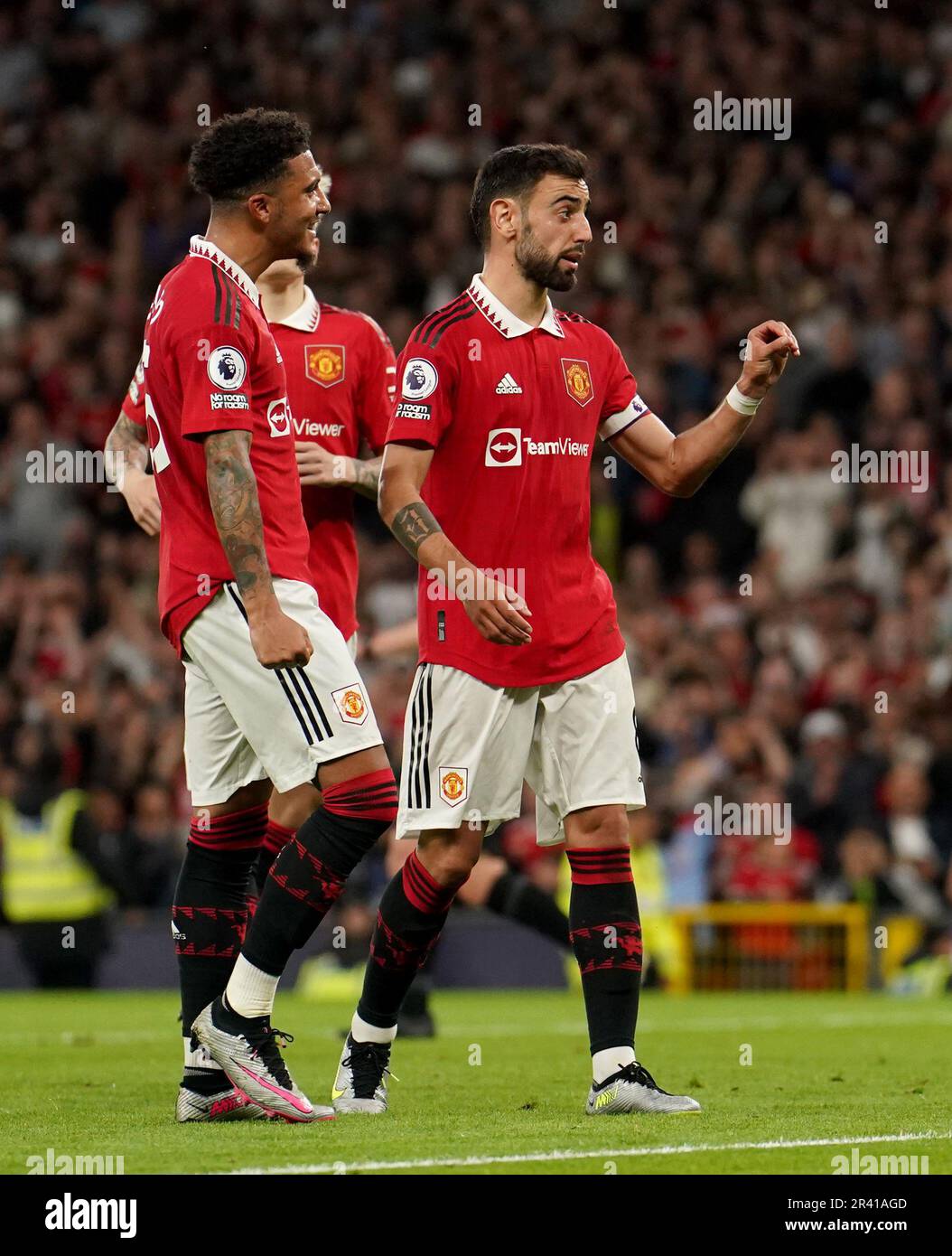 Manchester United's Bruno Fernandes gestures to the crowd as he celebrates scoring their side's third goal of the game from the penalty spot during the Premier League match at Old Trafford, Manchester. Picture date: Thursday May 25, 2023. Stock Photo