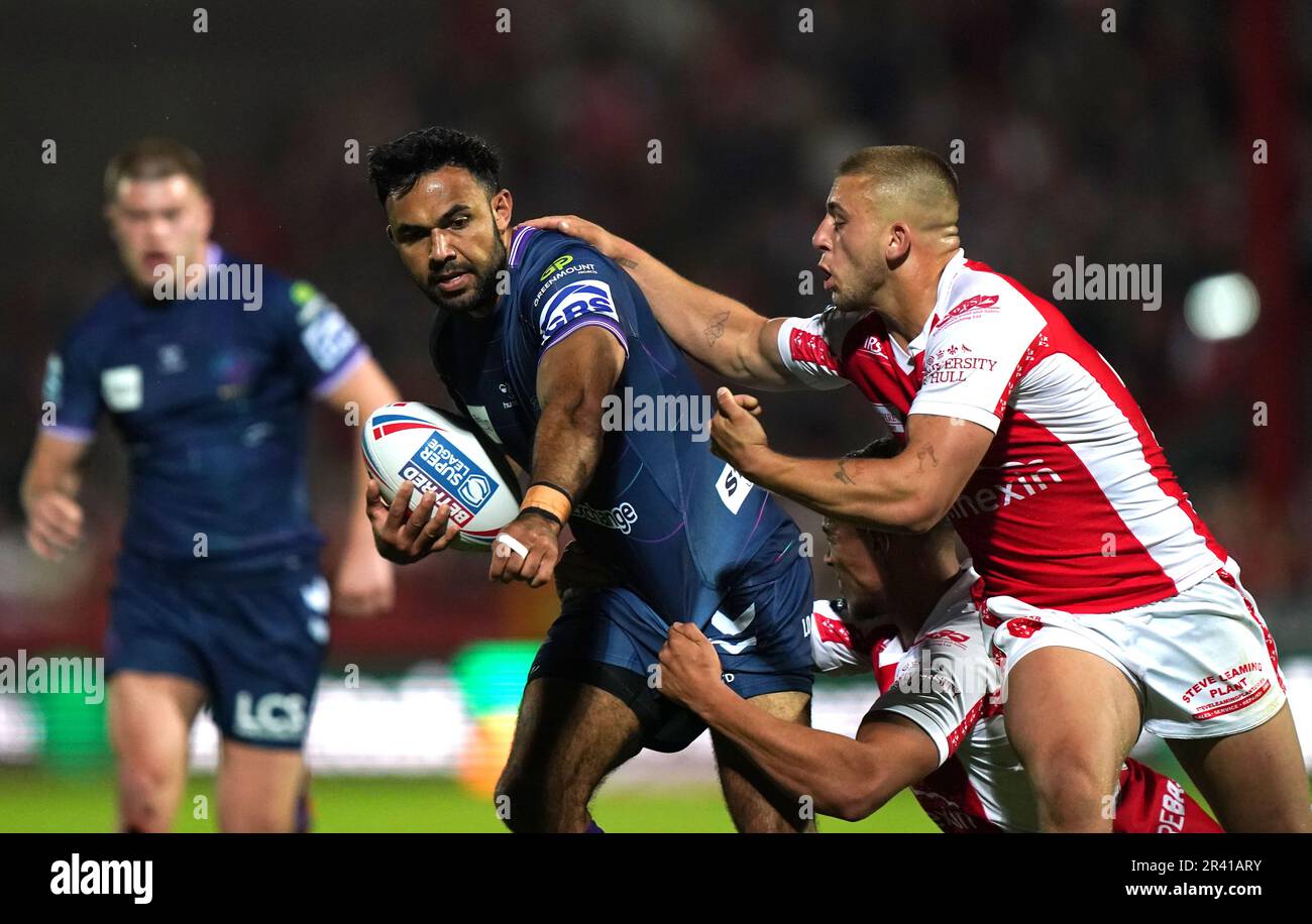 Wigan Warriors' Bevan French (left) attempts to get past Hull KR's Mikey Lewis during the Betfred Super League match at the Sewell Group Craven Park, Hull. Picture date: Thursday May 25, 2023. Stock Photo