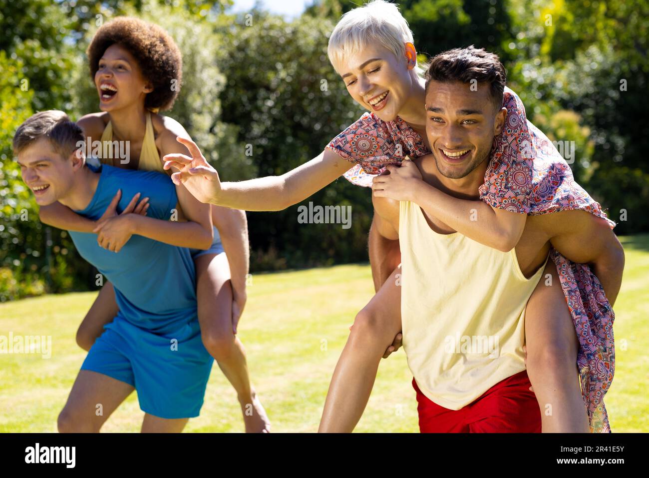 Midadult Caucasian Woman Giving Man Piggyback Stock Photo 3194063