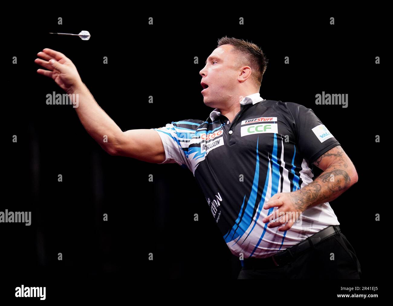 Gerwyn Price in action against Michael van Gerwen during the Cazoo Premier League play-offs at The O2, London. Picture date: Thursday May 25, 2023. Stock Photo