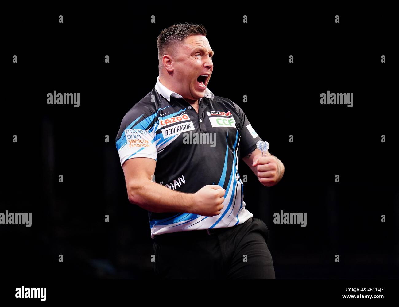 Gerwyn Price in action against Michael van Gerwen during the Cazoo Premier League play-offs at The O2, London. Picture date: Thursday May 25, 2023. Stock Photo
