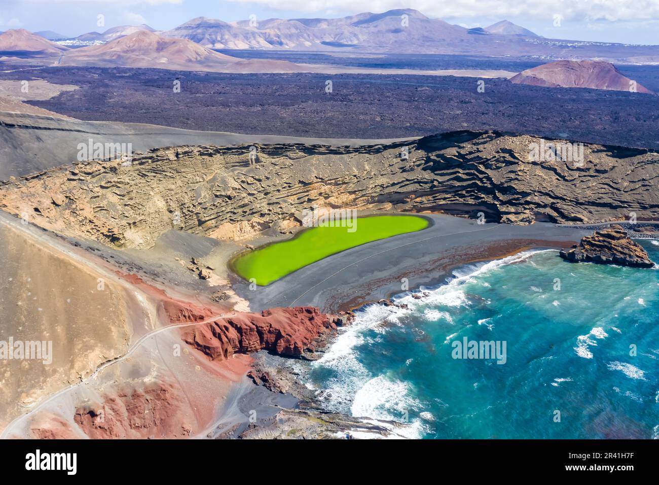 Green lake Charco de Los Clicos Verde near El Golfo on Lanzarote island aerial photo in Canary Islands in Spain Stock Photo