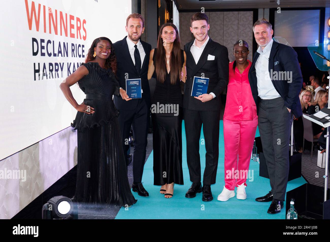 Harry Kane (second left), Declan Rice (third right) pose with their Football Ally of the Year awards, alongside Rosella Ayane (centre) and co-hosts Eni Aluko and Jamie Carragher at the SHEIN Women's Football Awards held at Nobu Hotel, London. Picture date: Thursday May 25, 2022. Stock Photo
