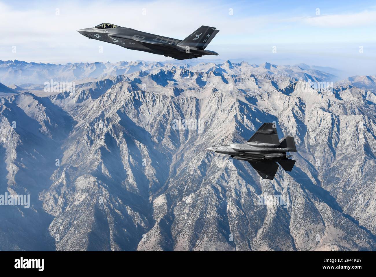 F-35C Lightning II's, attached to the “Argonauts” of Strike Fighter Squadron (VFA) 147, stationed at Naval Air Station Lemoore, fly in formation . VFA-147 is the first U.S. Navy Operational F-35C squadron based out of NAS Lemoore. Commander, Joint Strike Fighter Wing, headquartered at Naval Air Station Lemoore, Calif. ensures that each F-35C squadron is fully combat-ready to conduct carrier-based, all-weather, attack, fighter and support missions for Commander, Naval Air Forces. U.S. Navy/DoD photo by Shannon E. Renfroe Stock Photo