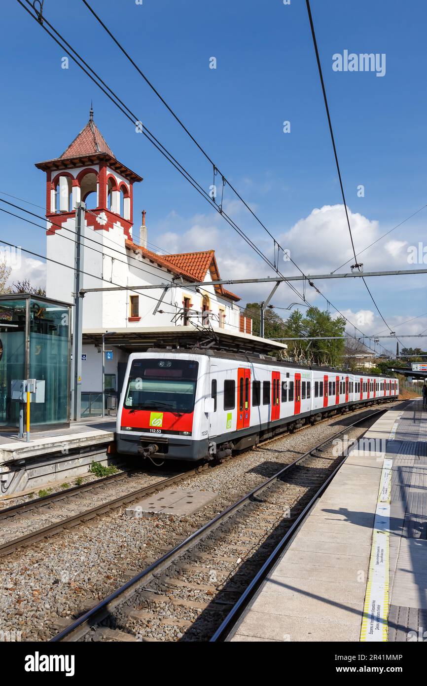 Local train of FGC train railroad vertical format in Valldoreix station