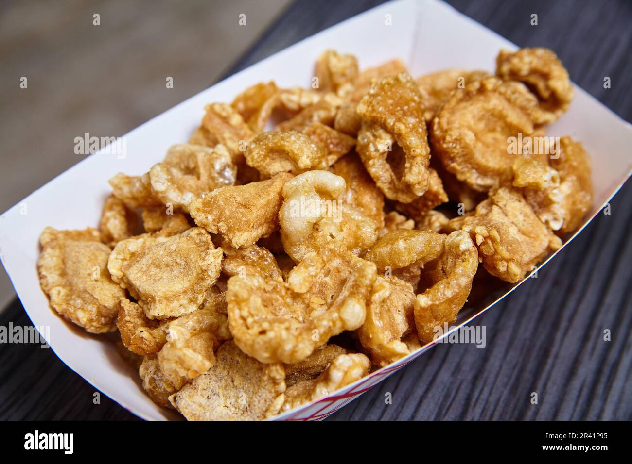 Kora Rind P Pork Rinds chicharrones white tray red stripes slate gray textured ...