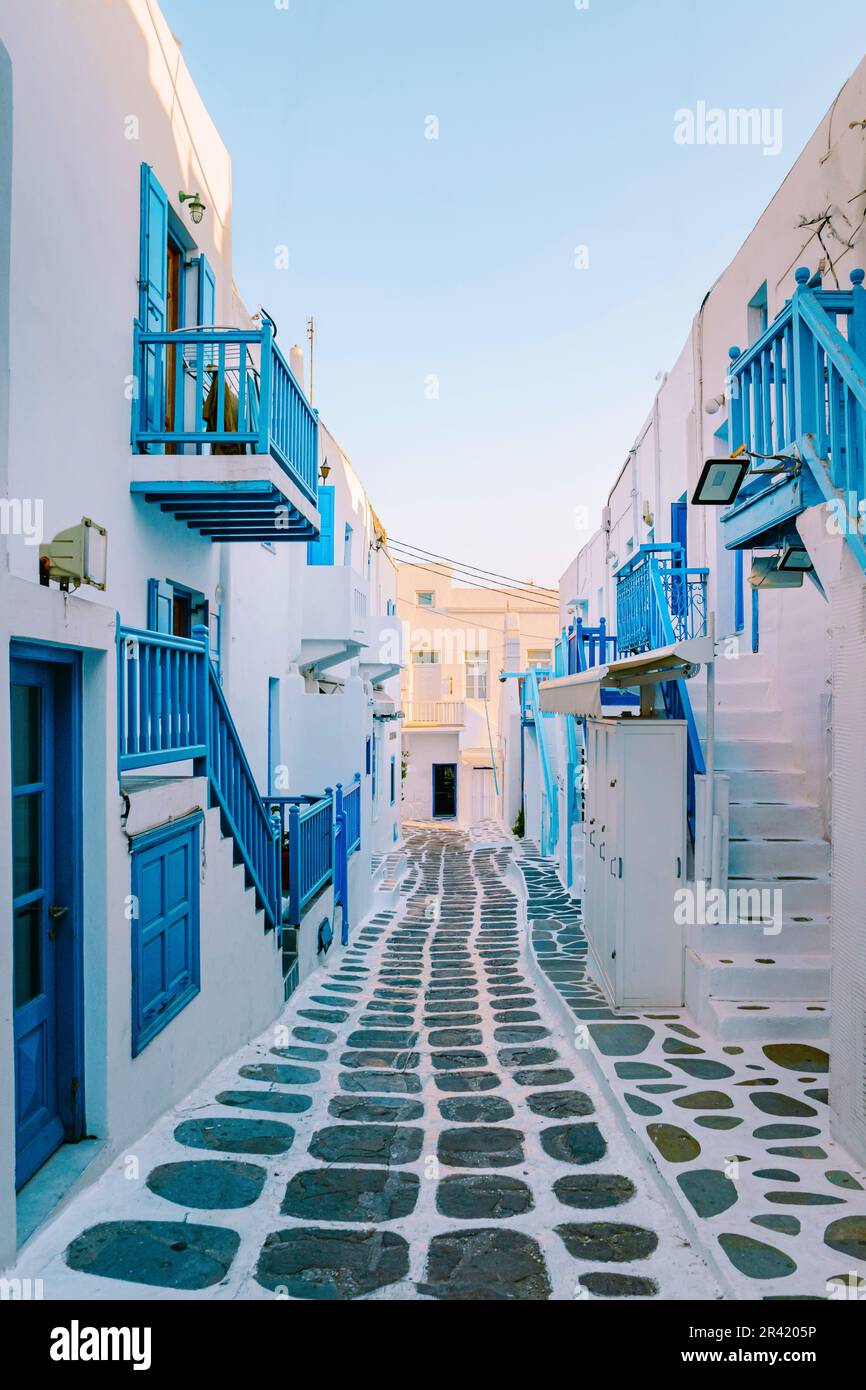mykonos-greece-colorful-streets-of-the-old-town-of-mykonos-with-tourist-in-the-street-2R4205P.jpg