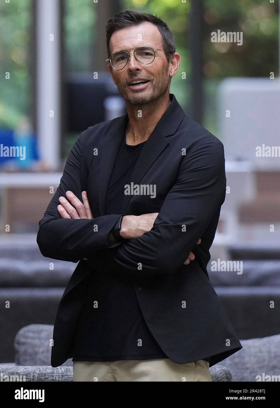Lululemon CEO Calvin McDonald poses after speaking at a news conference at  the company's headquarters, in Vancouver, on Thursday, May 25, 2023.  (Darryl Dyck/The Canadian Press via AP Stock Photo - Alamy