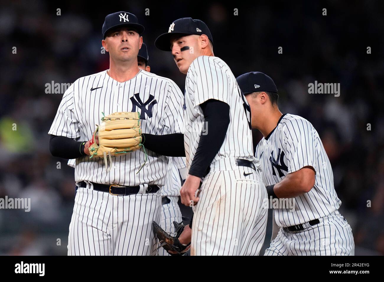 New York Yankees relief pitcher Nick Ramirez, left, is consoled by