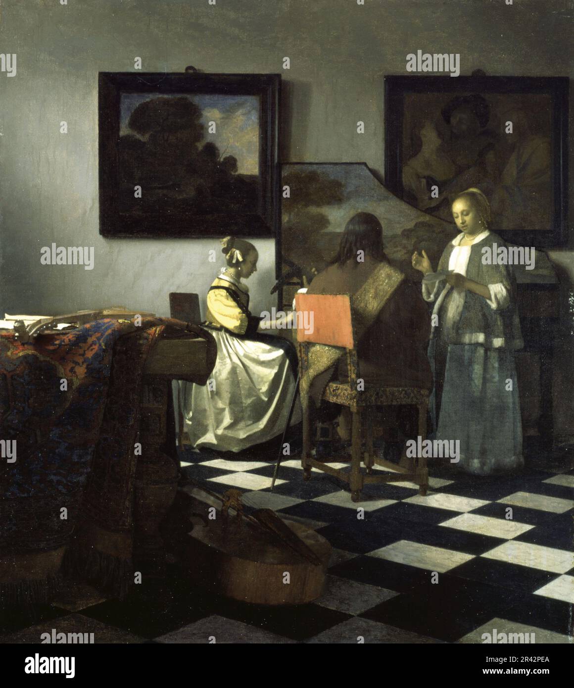 The Concert painted by the Dutch Golden Age painter Johannes Vermeer in 1664 Stock Photo