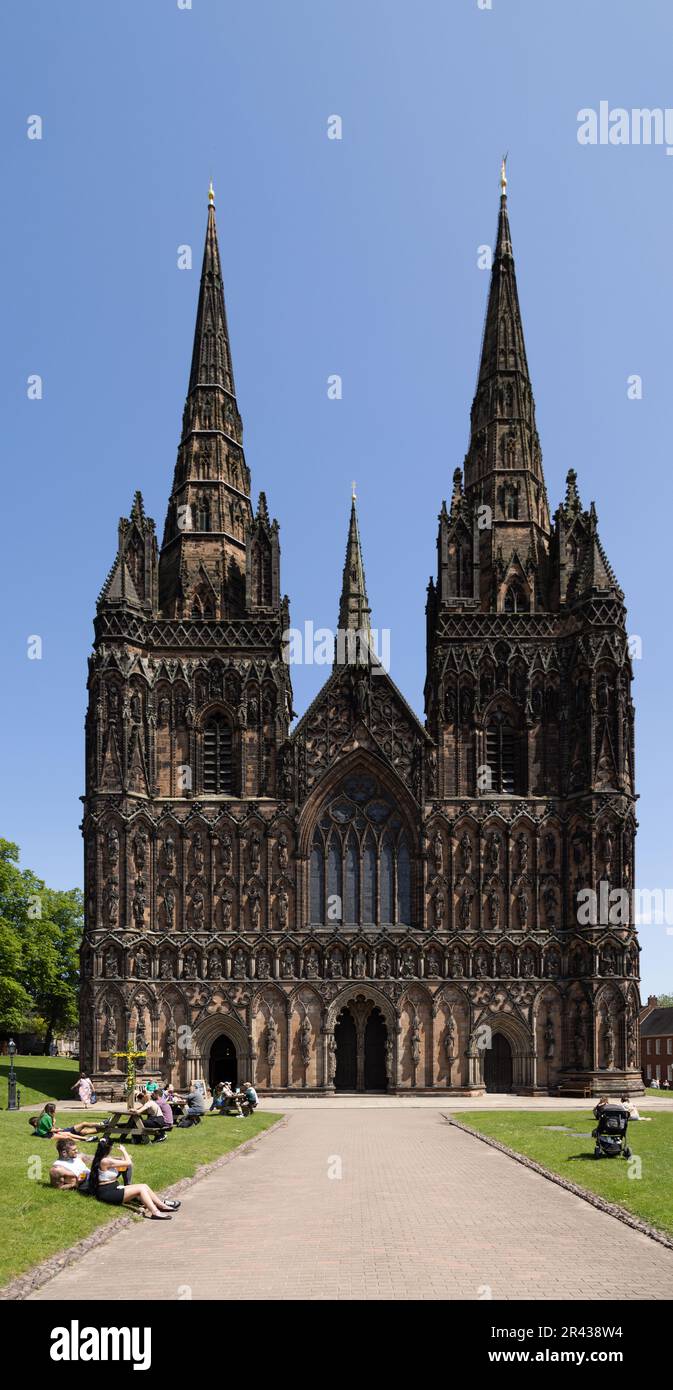 The West front of Lichfield Cathedral. With it's wonderful Gothic architecture. Lichfield Cathedral is a popular tourist destination. Stock Photo