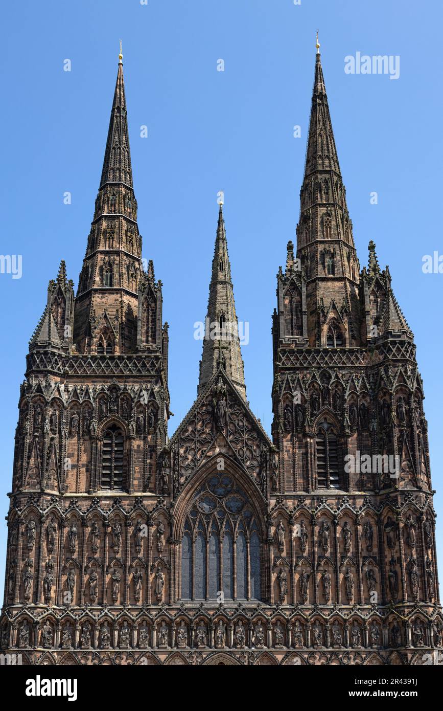 Detail of the West front of Lichfield Cathedral. With it's wonderful Gothic architecture. Lichfield Cathedral is a popular tourist destination. Stock Photo