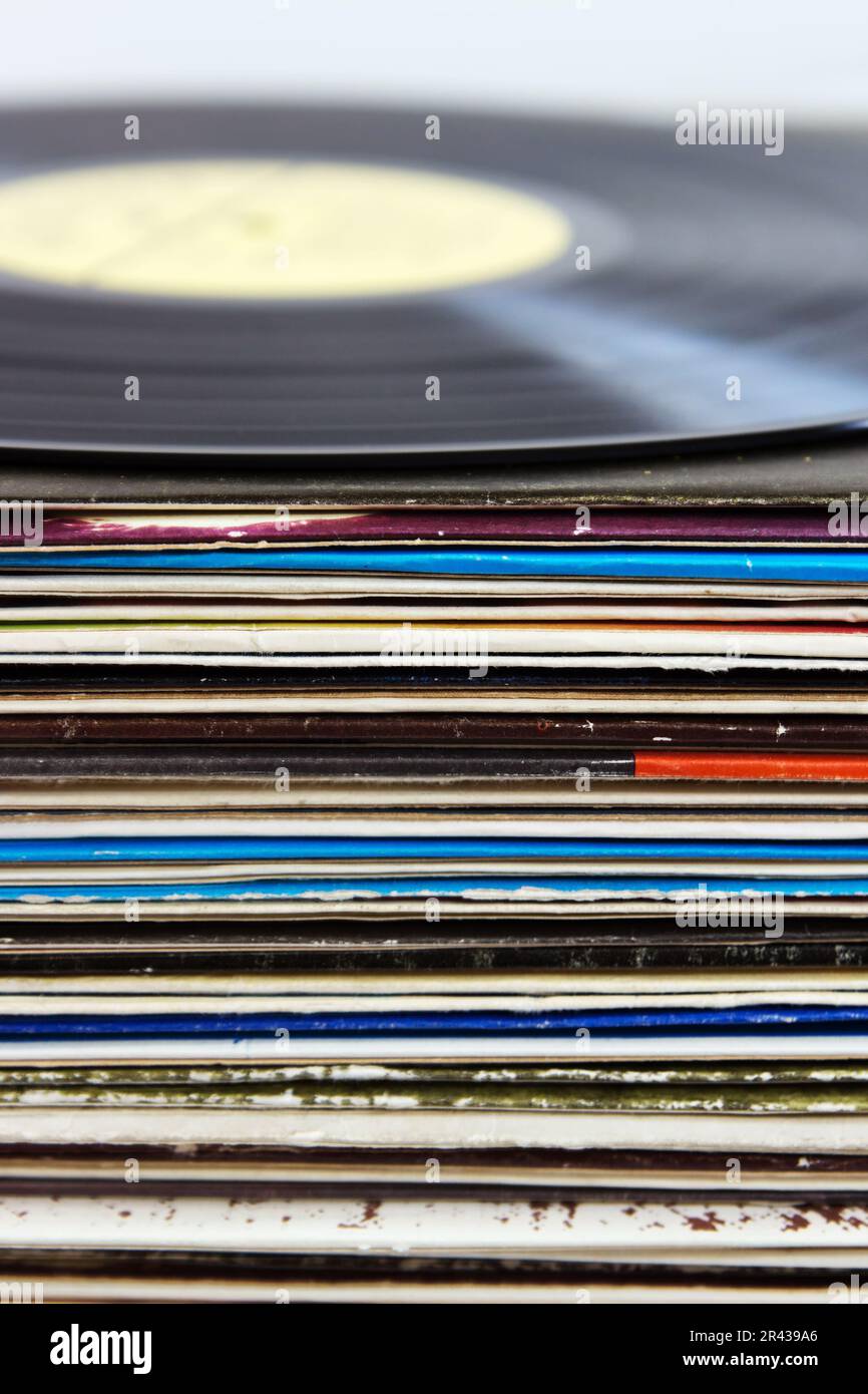 Vinyl recording disk and different albums with plates Stock Photo Alamy