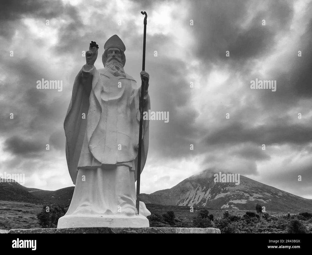 White statue of Saint Patrick at the start of foot path to the peak of Croagh Patrick, county Mayo, Ireland Stock Photo