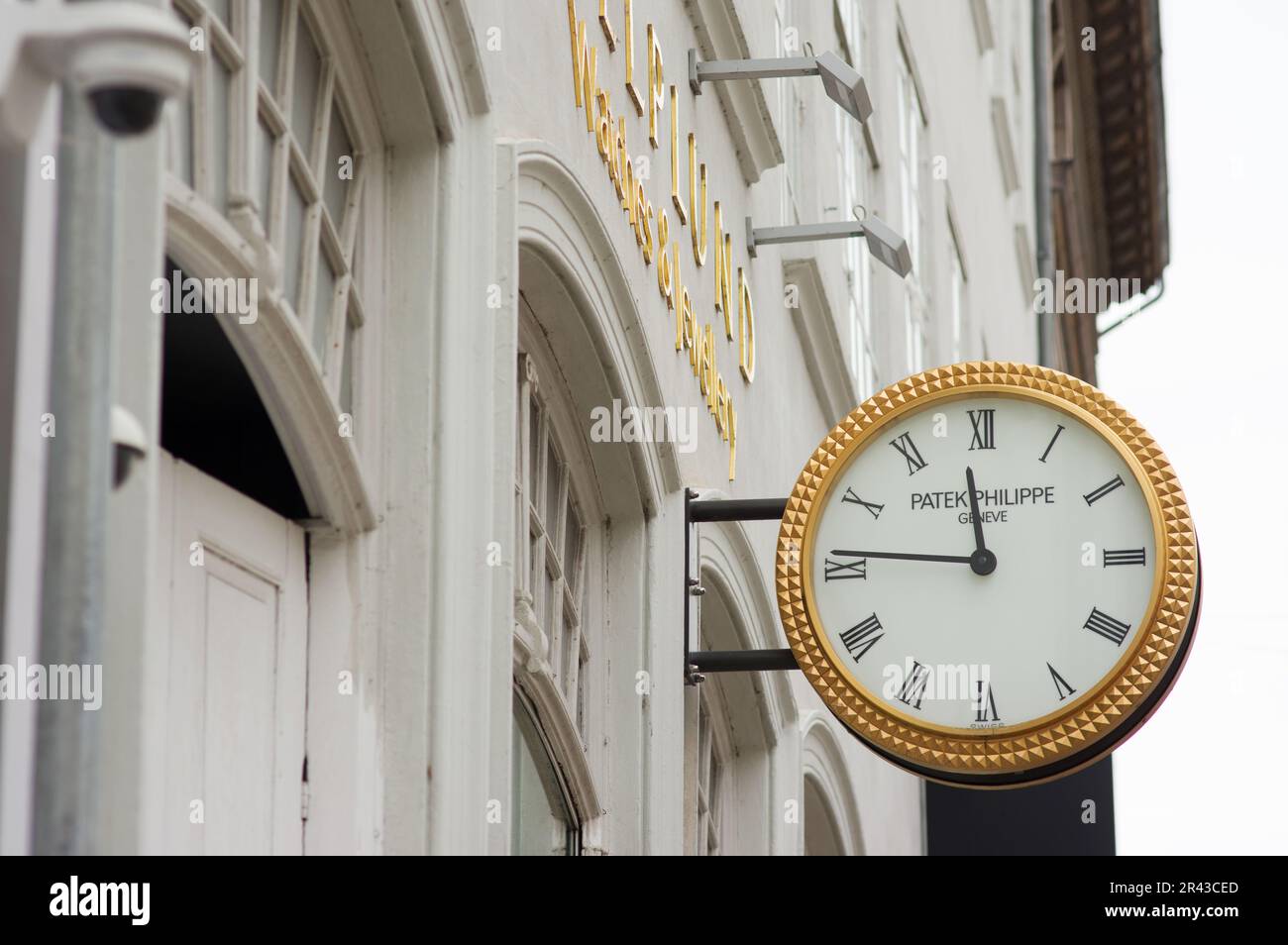 Copenhagen, Denmark - April 9, 2023: White Patek Philippe clock on a facade  of a shop Rolex is a Swiss watch designer and manufacturer Stock Photo -  Alamy