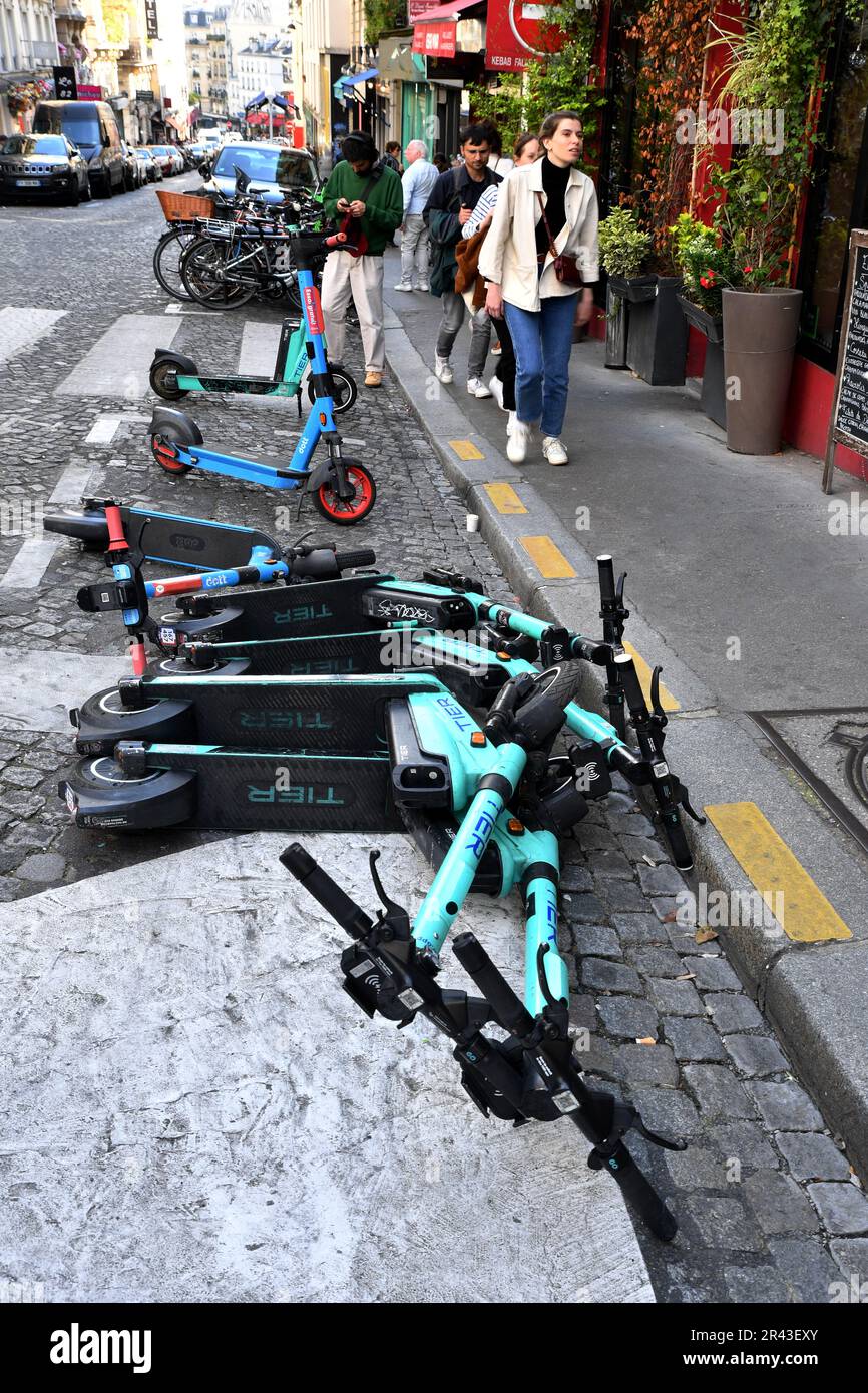 E-Scooters thrown on the pavement - Montmartre  - Paris - France Stock Photo