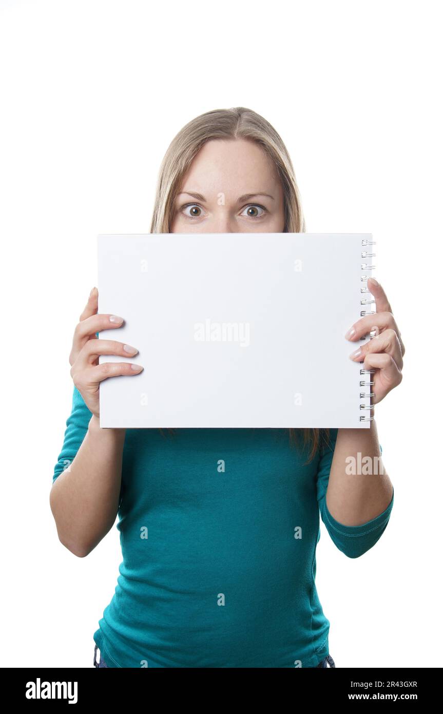 Young blonde woman holding blank sign with copy template Stock Photo