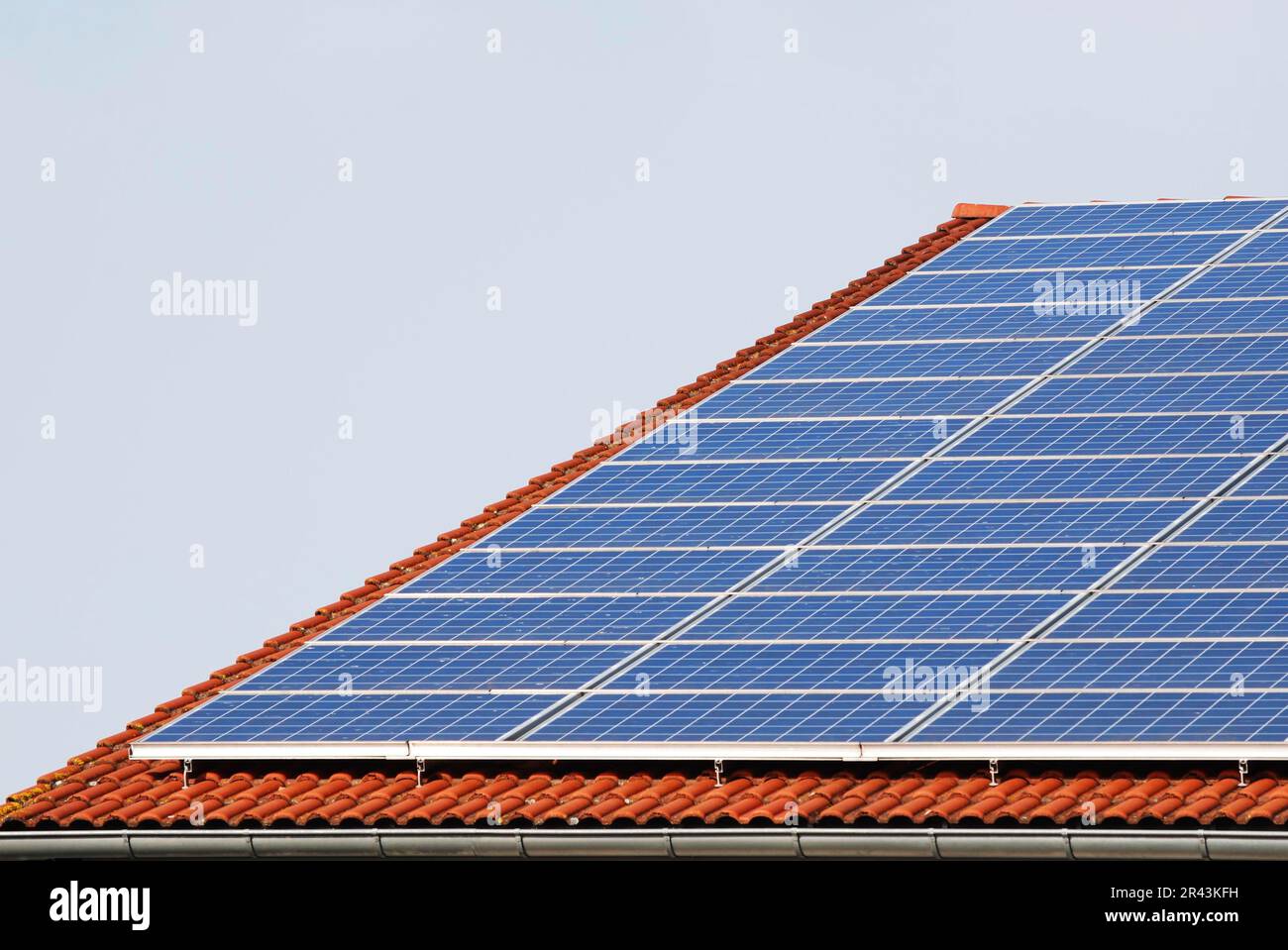 Alternative energy with photovoltaic panels on the roof Stock Photo