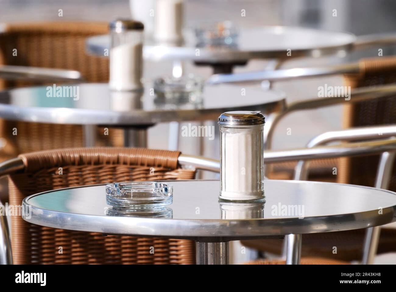 Place cover on the table of a sidewalk cafe Stock Photo
