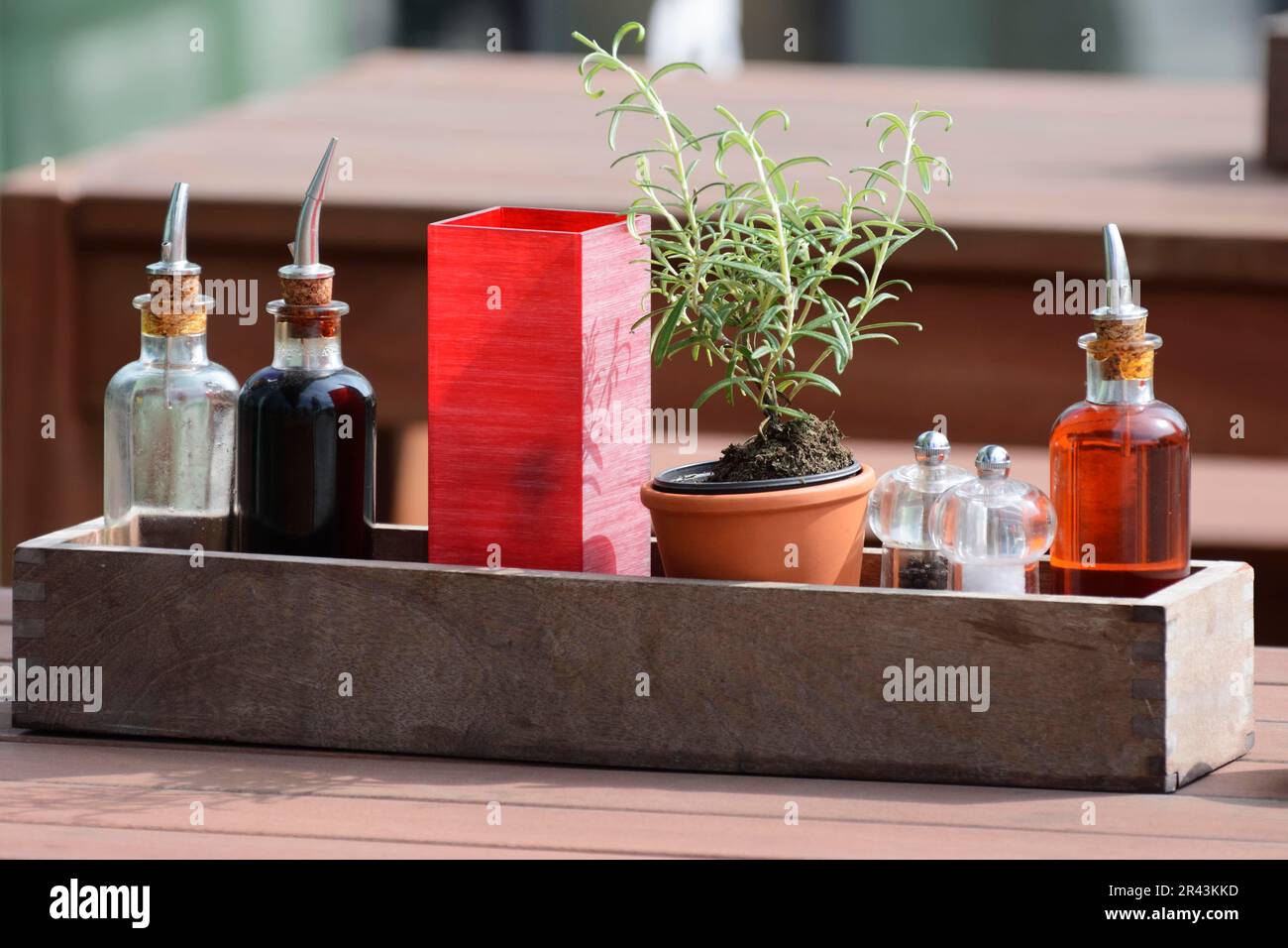 Vinegar, olive oil salt and pepper on a restaurant table Stock Photo