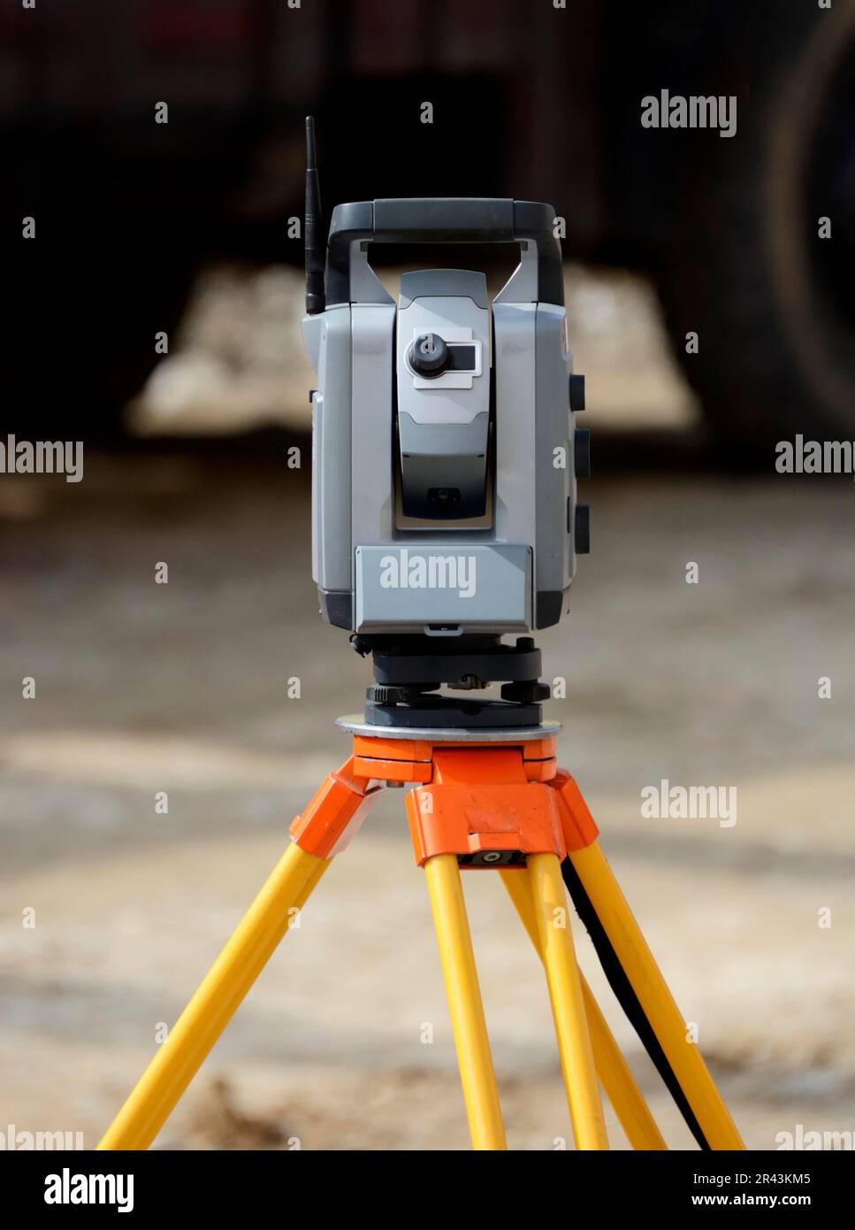 Theodolite on a tripod for surveying on a construction site Stock Photo ...
