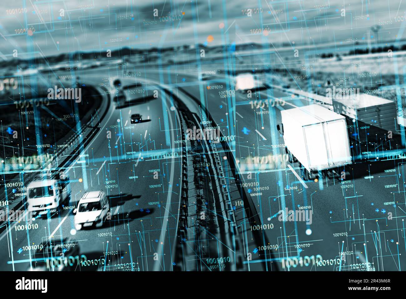 Car and trucks driving on a highway with technology assistant tracking