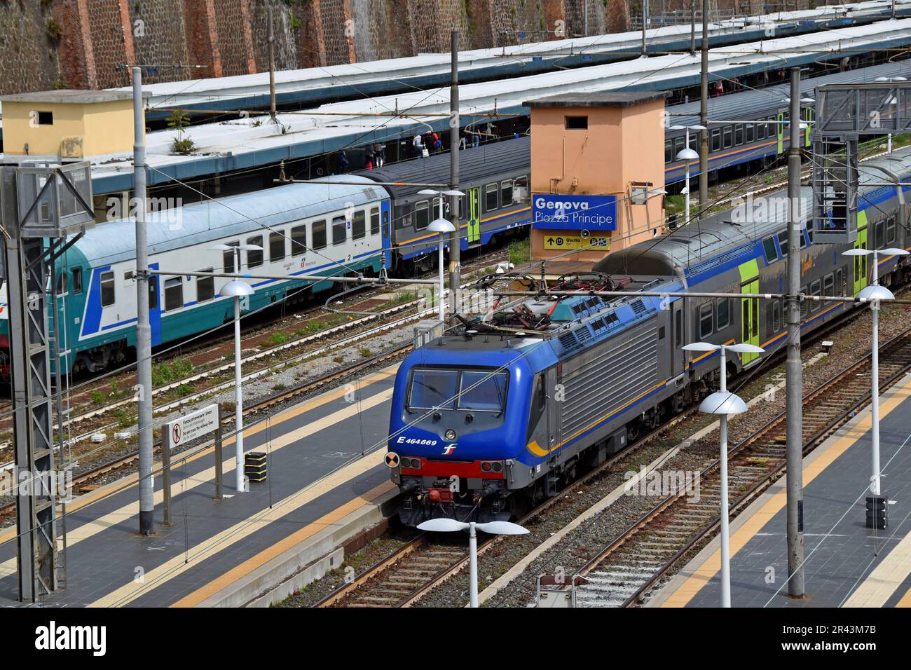 Trenitalia passenger trains waiting at platforms at Genova Piazza