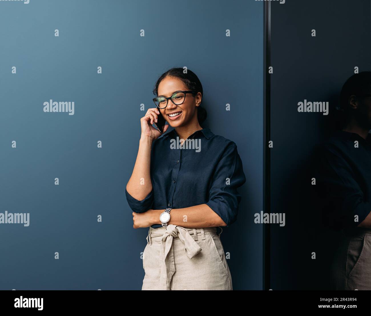Positive woman in business clothes hi-res stock photography and images ...