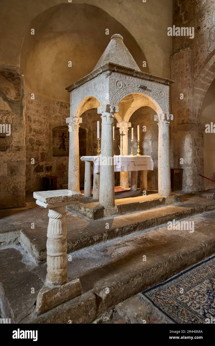 interior view with altar of Romanesque church of Santa Maria Annunziata, Centro Storico di Sovana, Tuscany, Italy Stock Photo