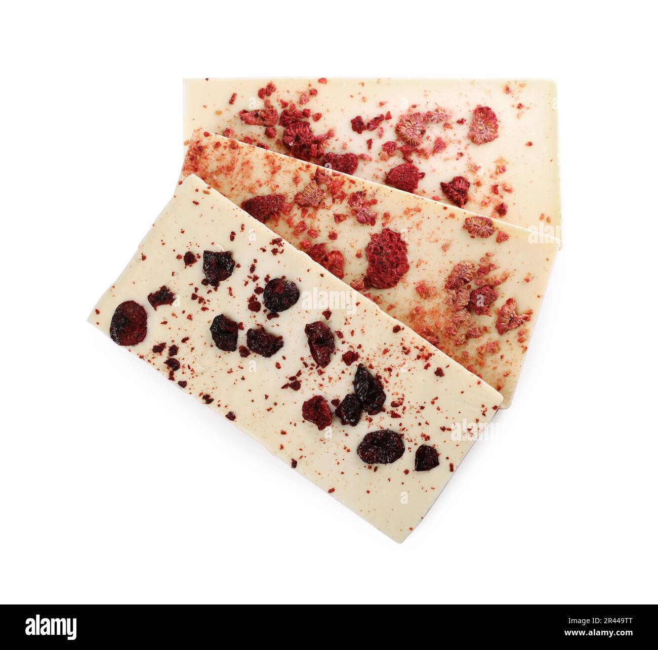Chocolate bars with freeze dried berries on white background, top view ...