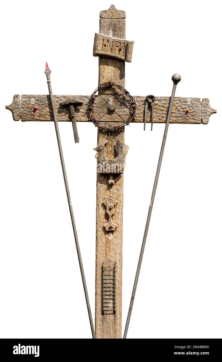 Old wooden cross with the symbols of the Passion of Jesus Christ