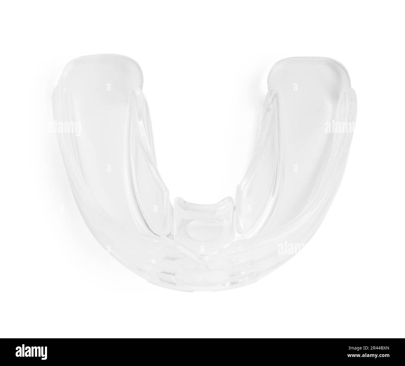 Transparent dental mouth guard isolated on white, top view. Bite