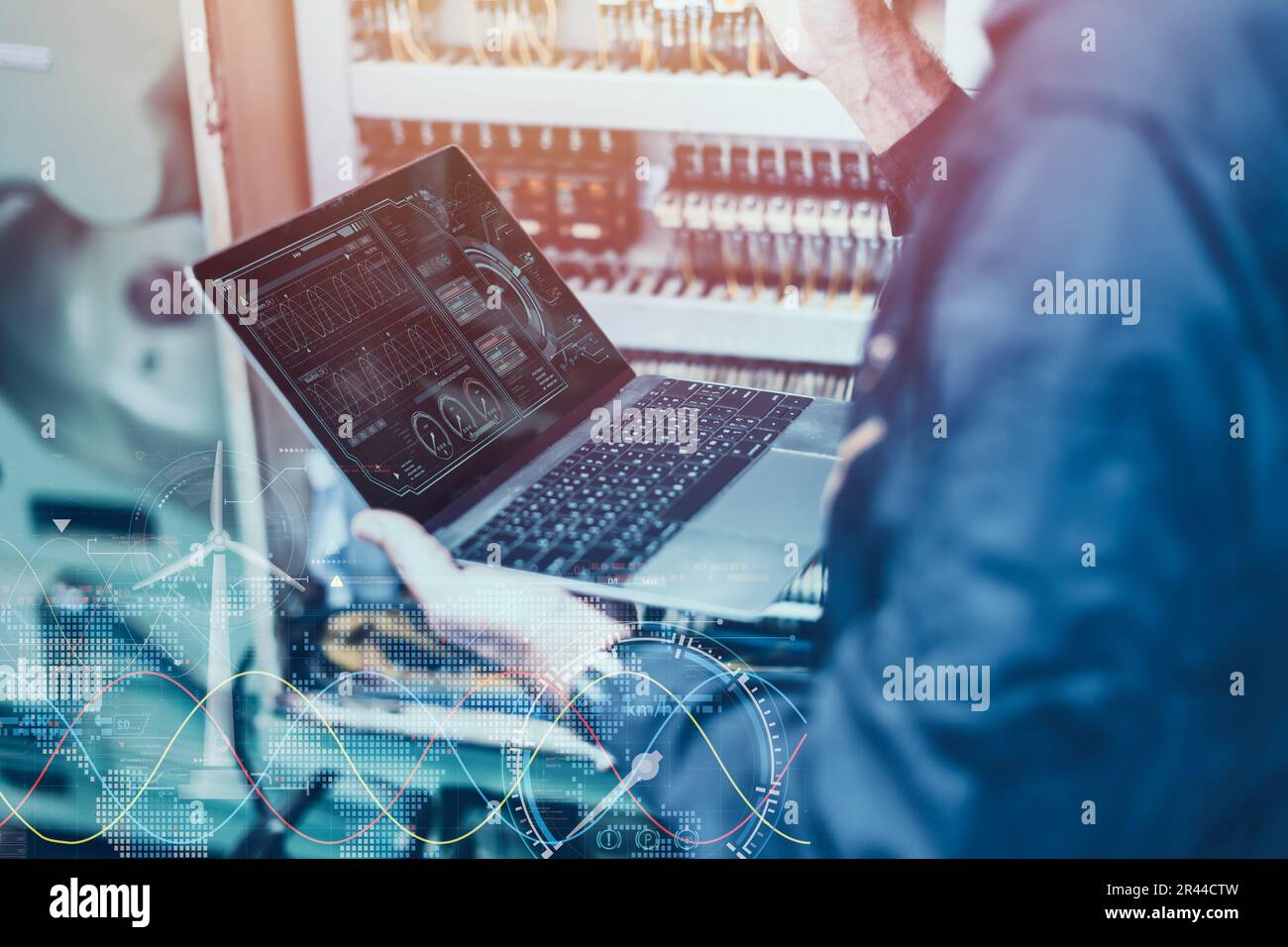 Electricity engineer work using AI computer software control monitor power consumption saving energy concept Stock Photo