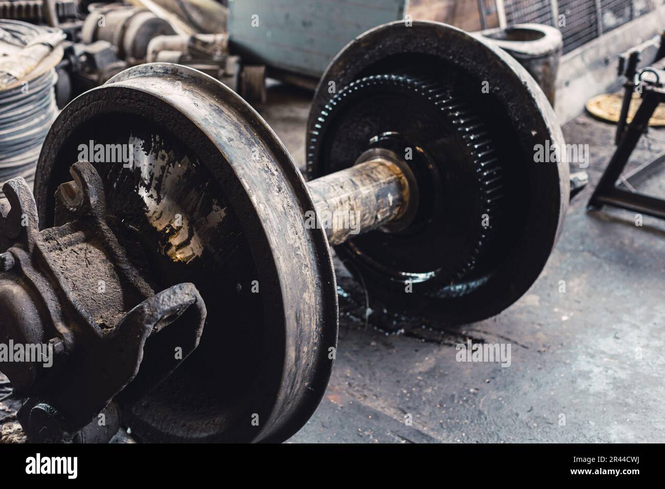 train wheel or rail wheel. old used closeup servicing spare part pair train steel wheels. Stock Photo