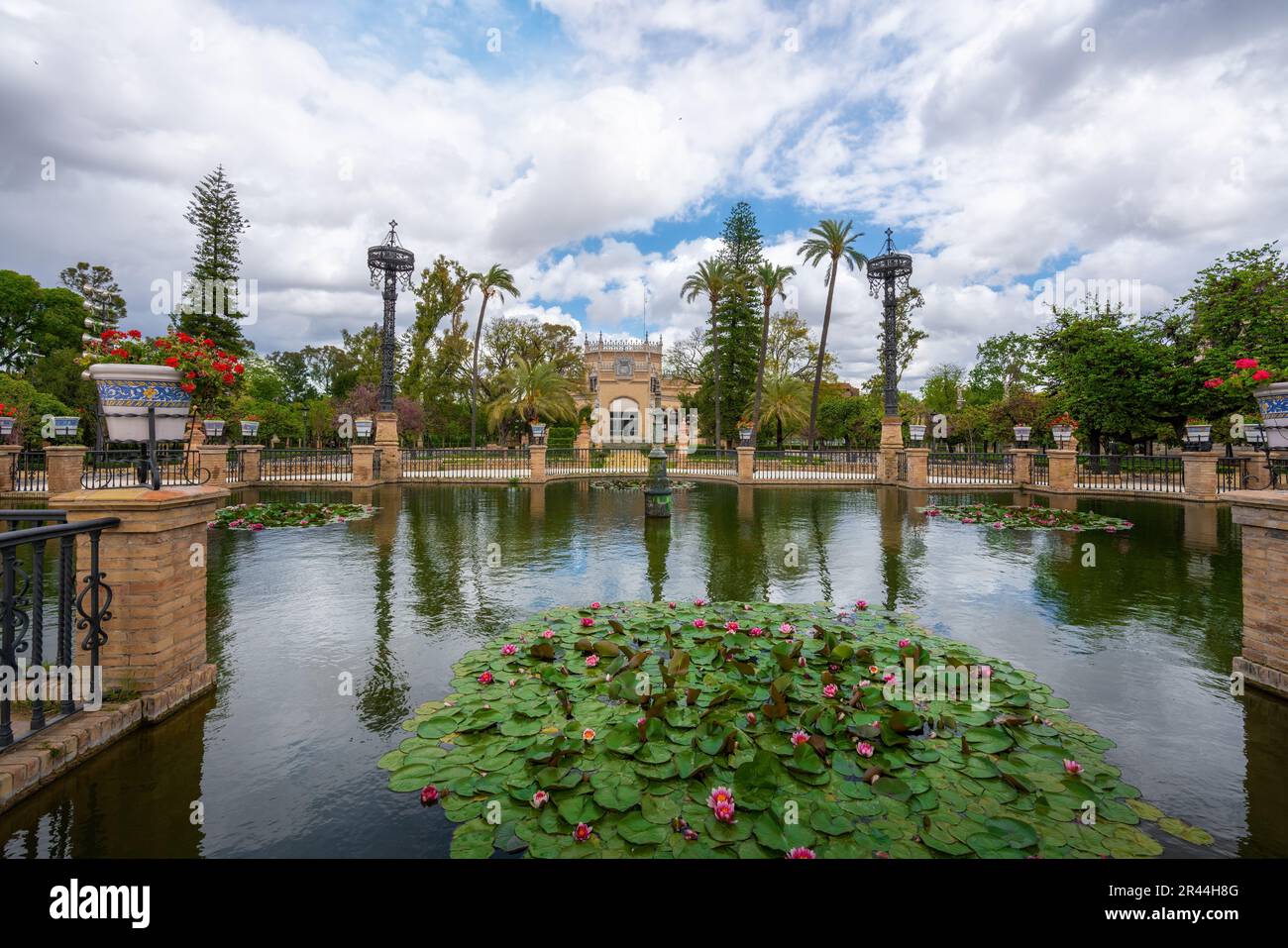 Plaza de America Central Pond and Royal pavilion (Pabellon Real) at Maria Luisa Park - Seville, Andalusia, Spain Stock Photo