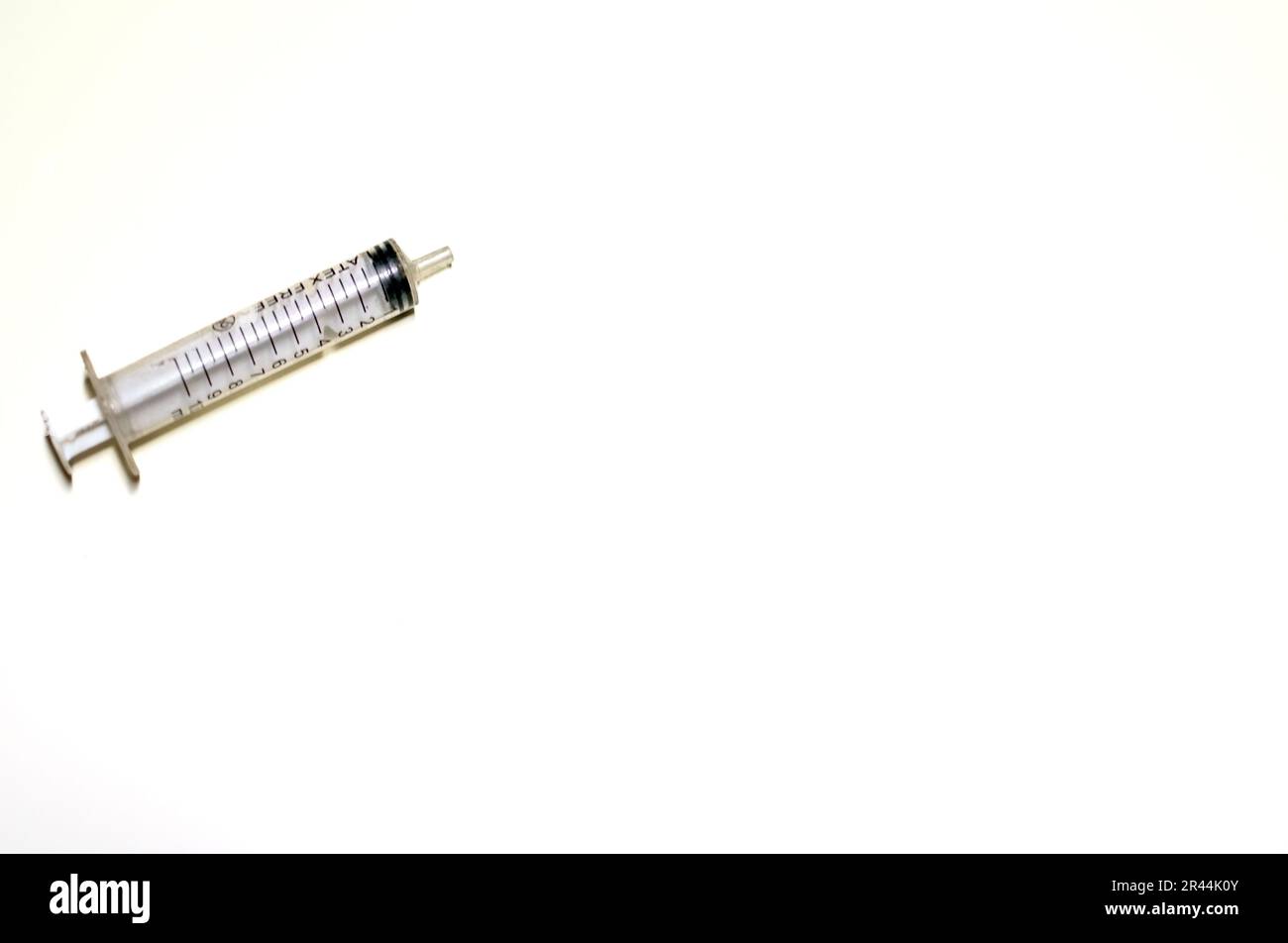 Plastic syringe isolated on white background with copy space Stock Photo Alamy