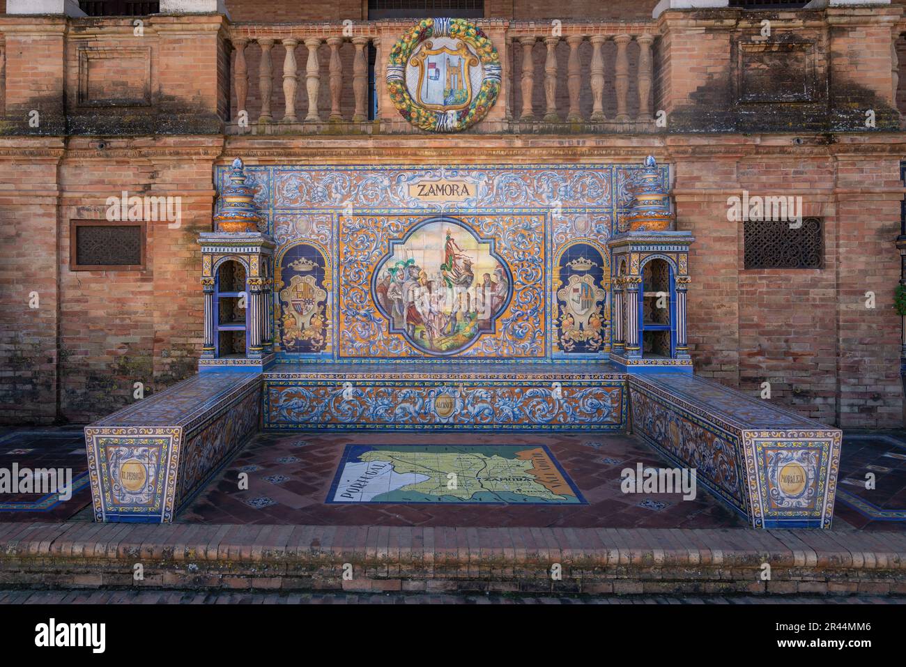 Alcove with bench and tiles representing Zamora Province - Seville, Andalusia, Spain Stock Photo