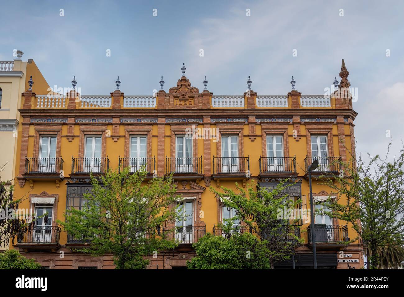 Building Facade at Calle San Fernando Street - Seville, Andalusia, Spain Stock Photo