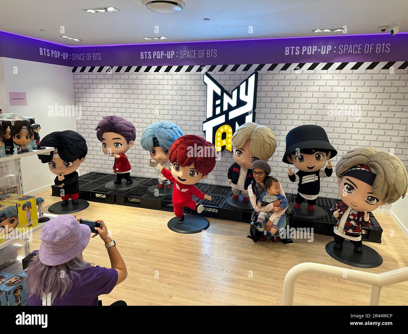 26th May, 2023. Space of BTS in Sydney A fan takes a photo of TinyTANs