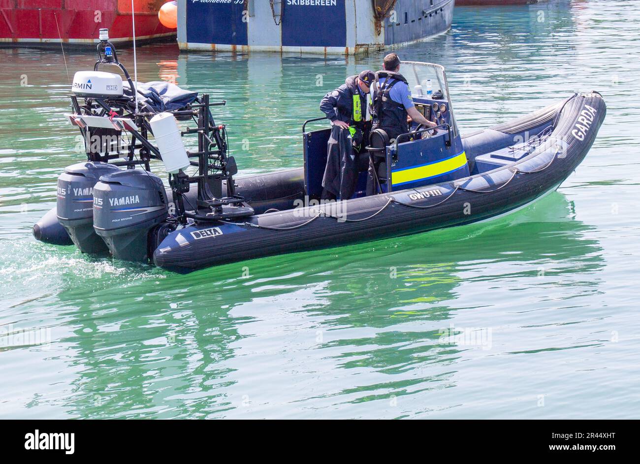 Glandore Harbour, West Cork, Ireland. Friday 26th May 2023 Members of the Garda Water Unit heading out of Glandore Harbour this afternoon to continue the search for the women missing since Tuesday in the Long Strand area. This unit has come down from Dublin to add to the assets already searching the sea in that area. Credit aphperspective/Alamy Live News Stock Photo