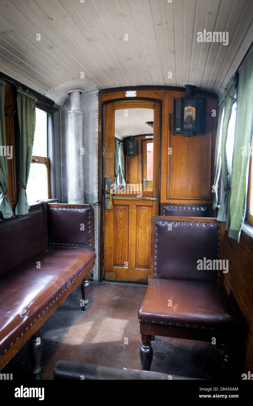 the inside of an old train carriage Stock Photo Alamy