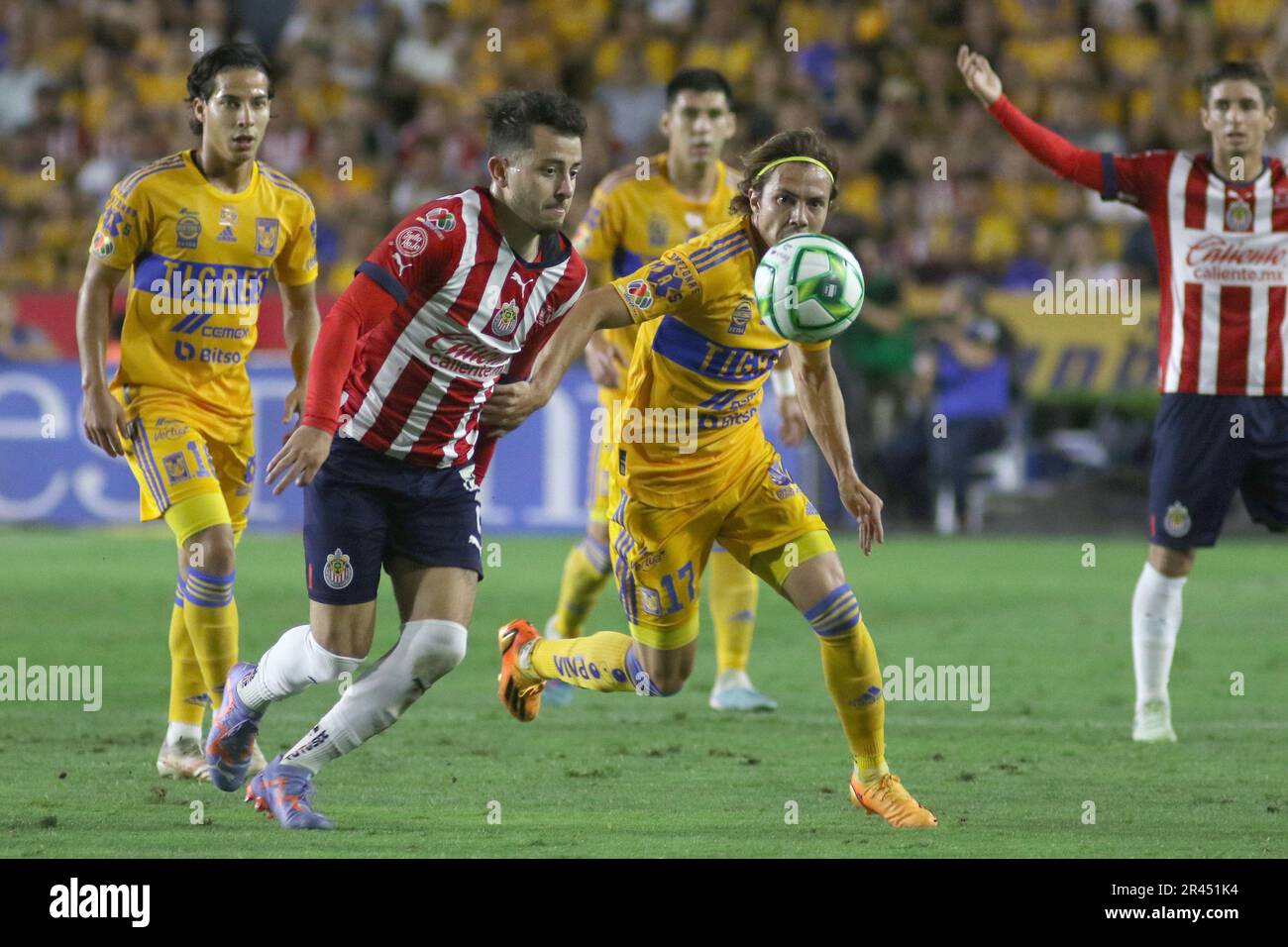 Monterrey, Mexico. 26th May, 2023. May 25, 2023, Monterrey, Mexico: Sebastián Cordova of Tigres of UANL and Alan Mozo of Chivas fight the ball during the Closing Tournament Final match, between Tigres of UANL and Chivas of Guadalajara of the Football MX League at University Stadium. on May 25, 2023 in Monterrey, Mexico. (Photo by Ismael Rosas/ Credit: Eyepix Group/Alamy Live News Stock Photo