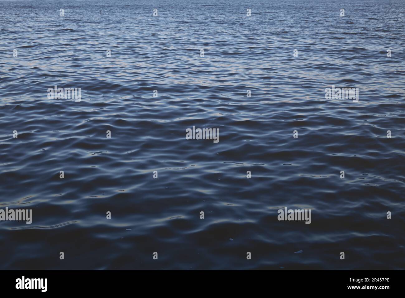 Sea abstract background dark blue surface of water Stock Photo - Alamy