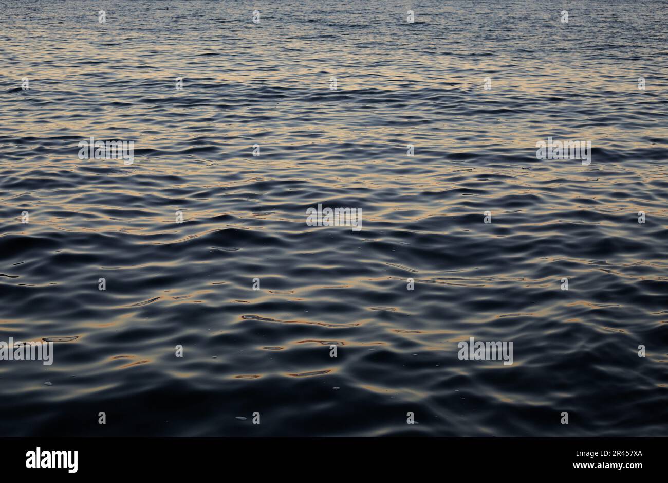 Sea abstract background dark blue surface of water Stock Photo - Alamy