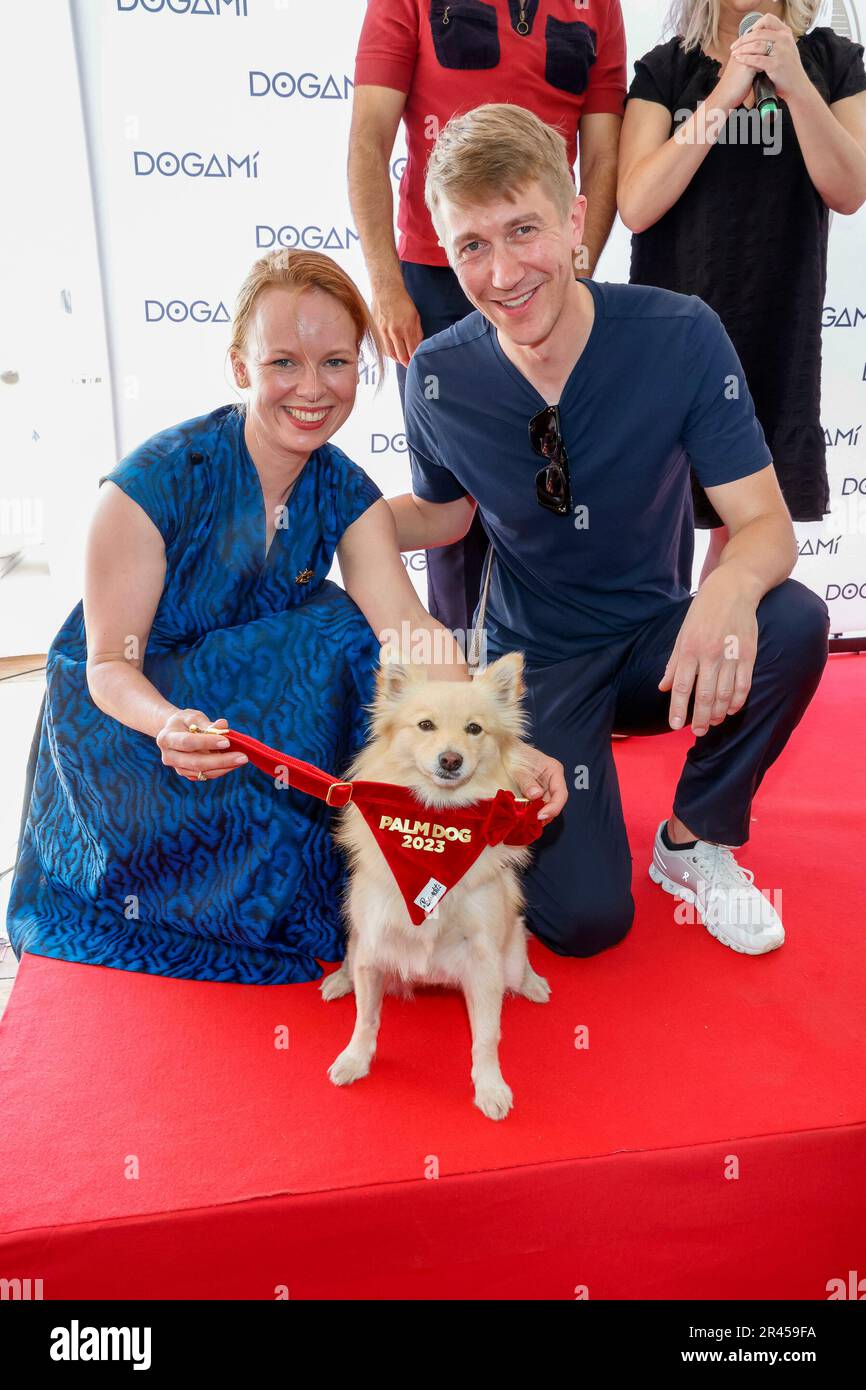 Alma Poysti and Jussi Vatanen with winning dog Bijou pose at the 'Palm Dog Award' during the 76th Cannes Film Festival at Palais des Festivals in Cannes, France, on 26 May 2023. Stock Photo
